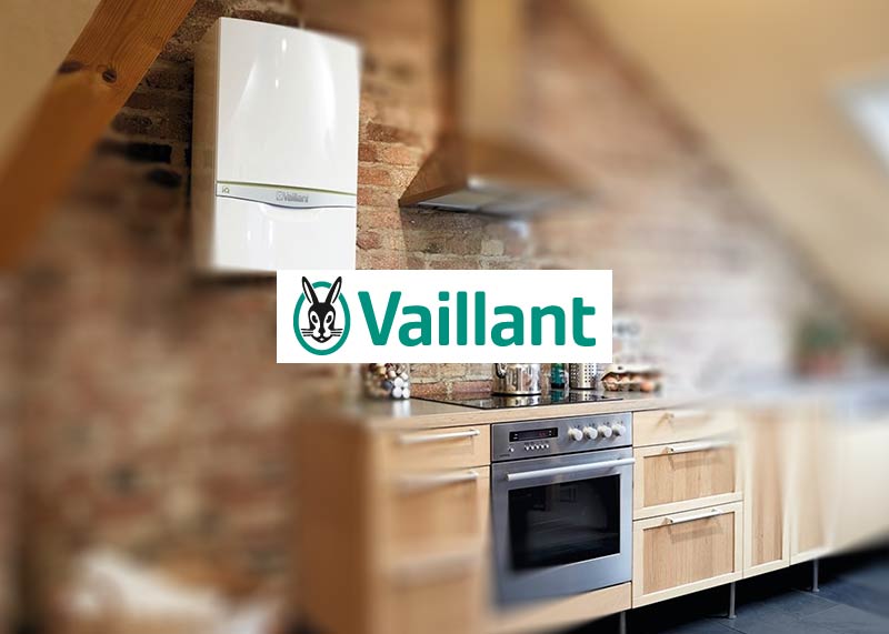 Vaillant boiler on kitchen wall, with Vaillant Logo over the image